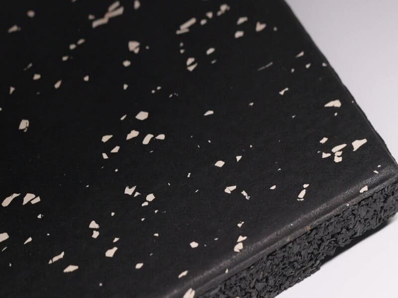 Comparison of vulcanized vs cold-pressed rubber flooring texture and density